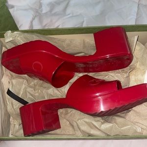 Red Gucci rubber slide sandals